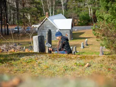 Community members walking the Paint Lake Cemetery Tour