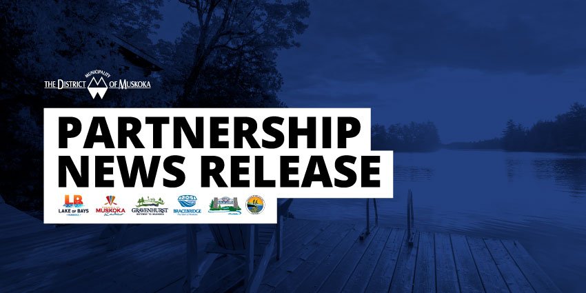 a boat dock with a sign that says partners news release