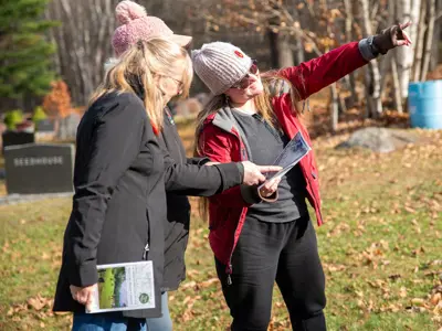 Community members walking the Paint Lake Cemetery Tour