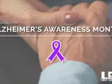 A picture with text that says Alzheimer's Awareness Month Flag Raising