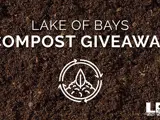 A picture of dirt with a sign that says "Lake of Bays Compost Giveaway"