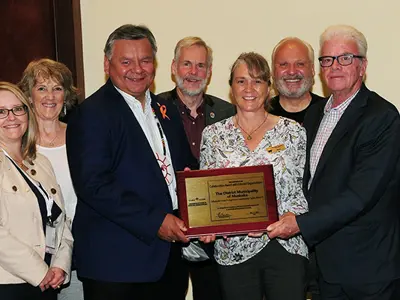 MAILT Members Receiving the 2023 Award of Excellence from the Canadian Association of Municipal Administrators (CAMA)